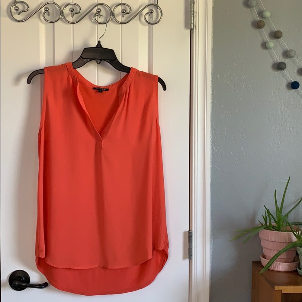 Coral sleeveless blouse